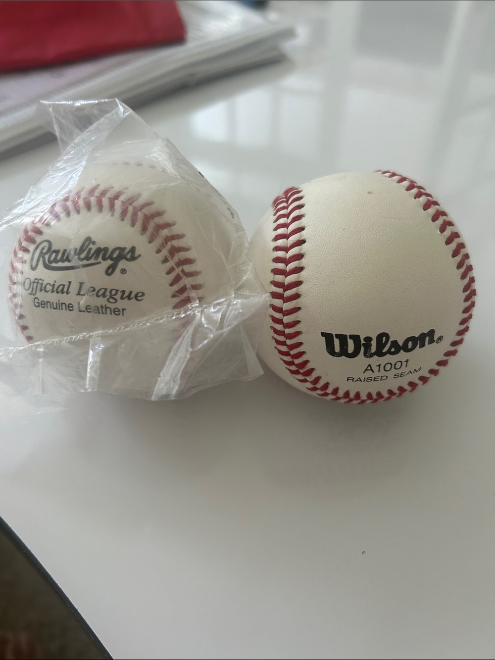 Wilson and Rawlings White Baseballs with Red Stitching